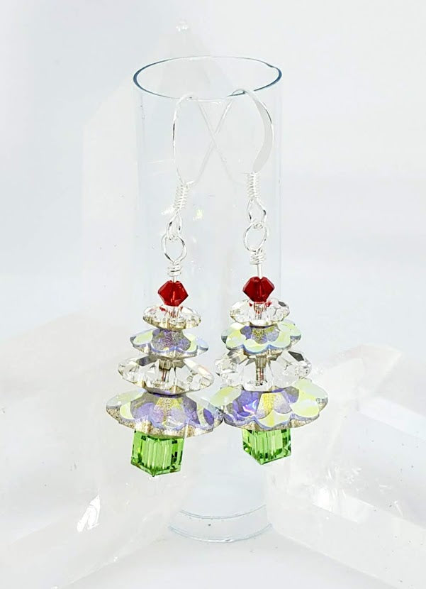4 tier Swarovski Crystal AB alternating with Silver backed margarita crystals giving a layered look. Sterling Silver Wire. 1.5" long. Reflective even in Firelight!