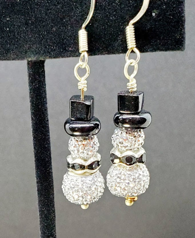 Disco Ball Snowman with black crystal rondell collar. 1.25" long. Silver tone wire.