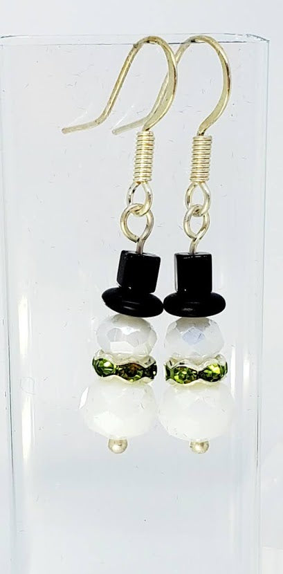 Faceted AB glass bead with green crystal rondell collar. 1.25" long.