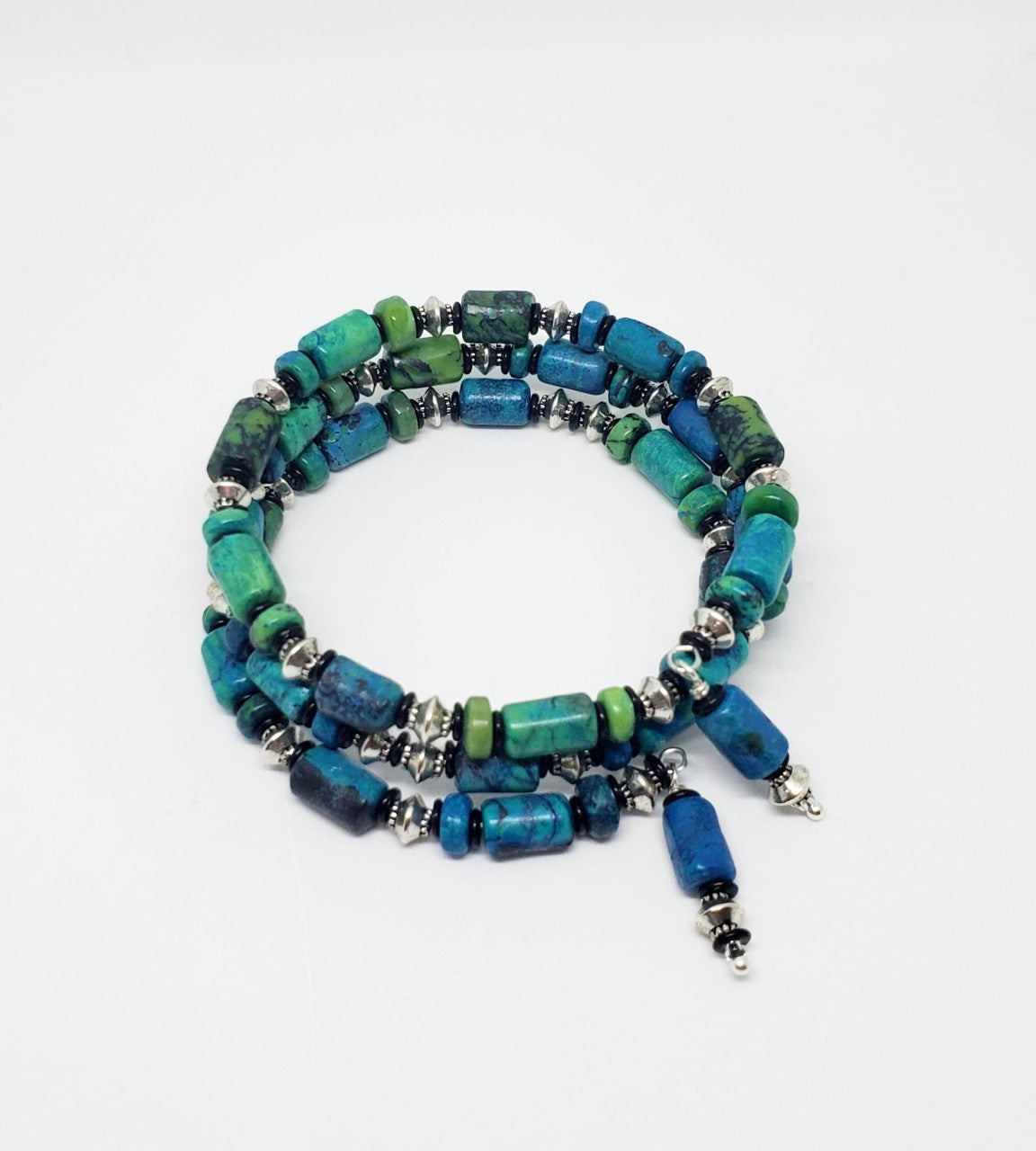 The Ethical Beauty of Layered Charm's Semi-Precious Stretch Bead Brace