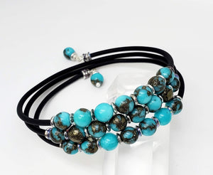 Turquoise & Pyrite, also upcycled material from both stones to make these attractive beads. 